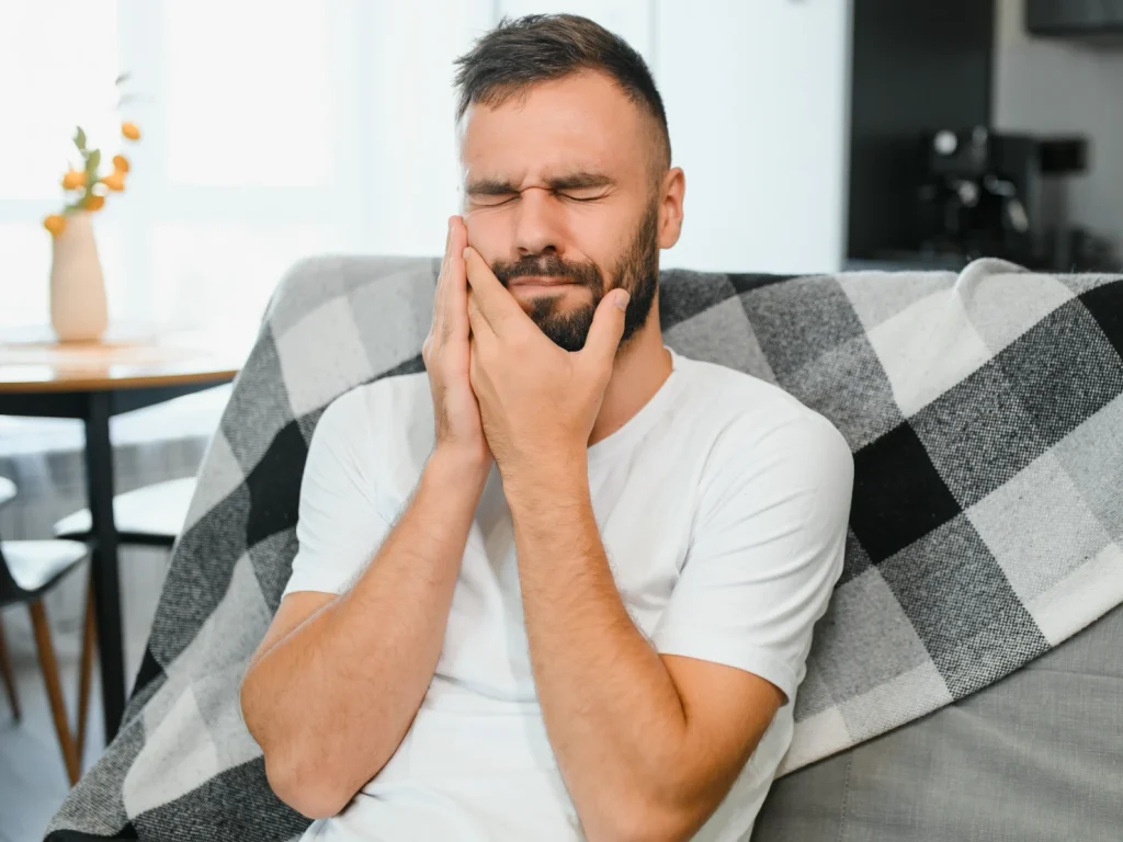 Man with tooth pain | Emergency dentist in Wiggins, MS at Wiggins Family Dentistry